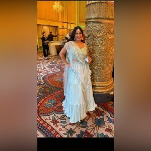 Metallic Light Blue tiered Lehenga with mirror blouse ruffled net dupatta